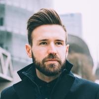 Man wearing collared jacket